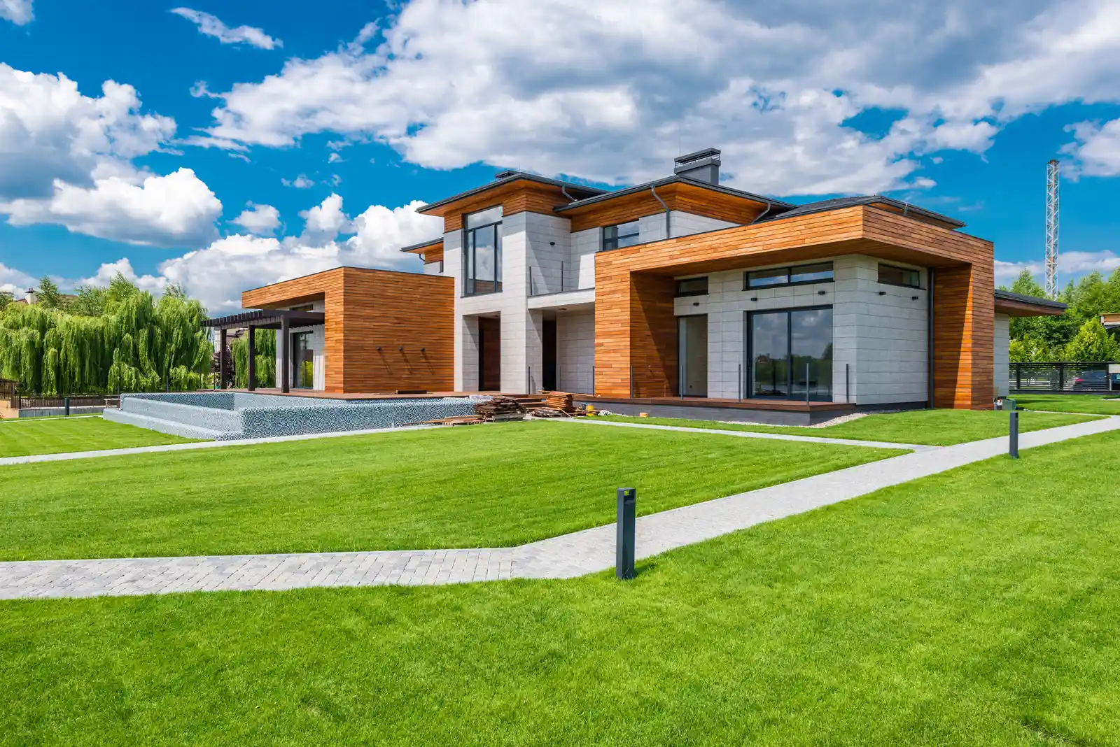 Modern custom-built home showcasing premium brick and stone craftsmanship