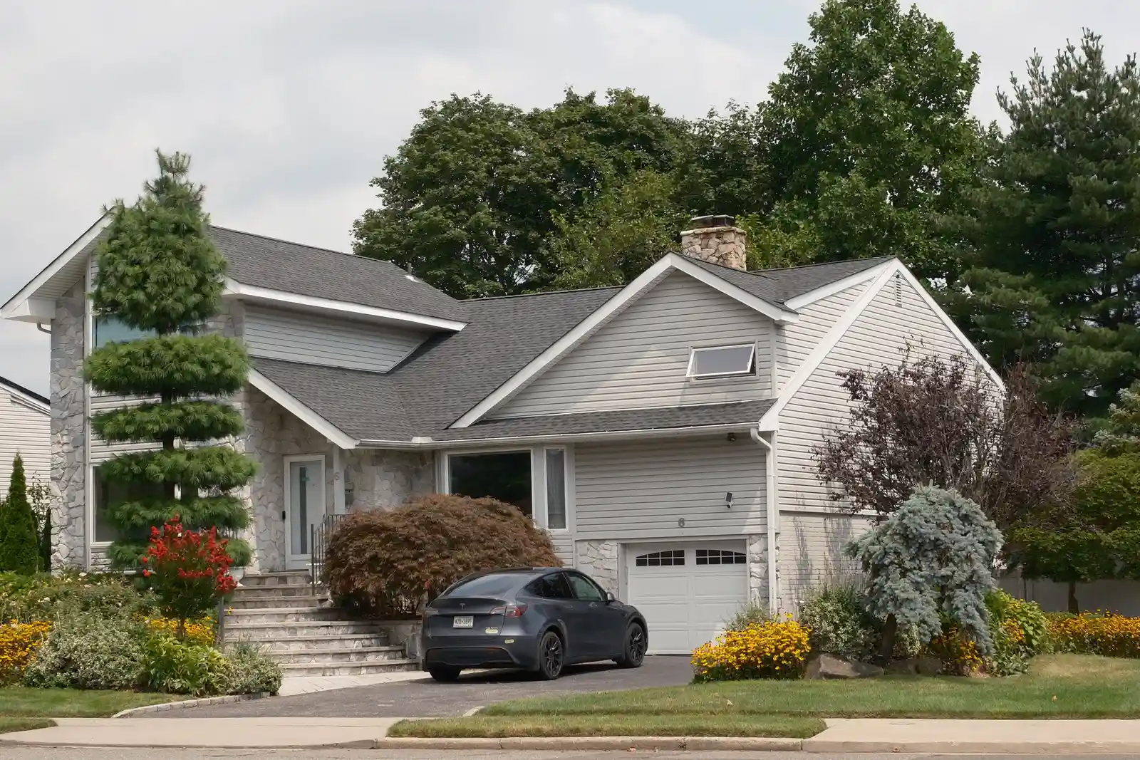After: finished new stone veneer facade on a custom home