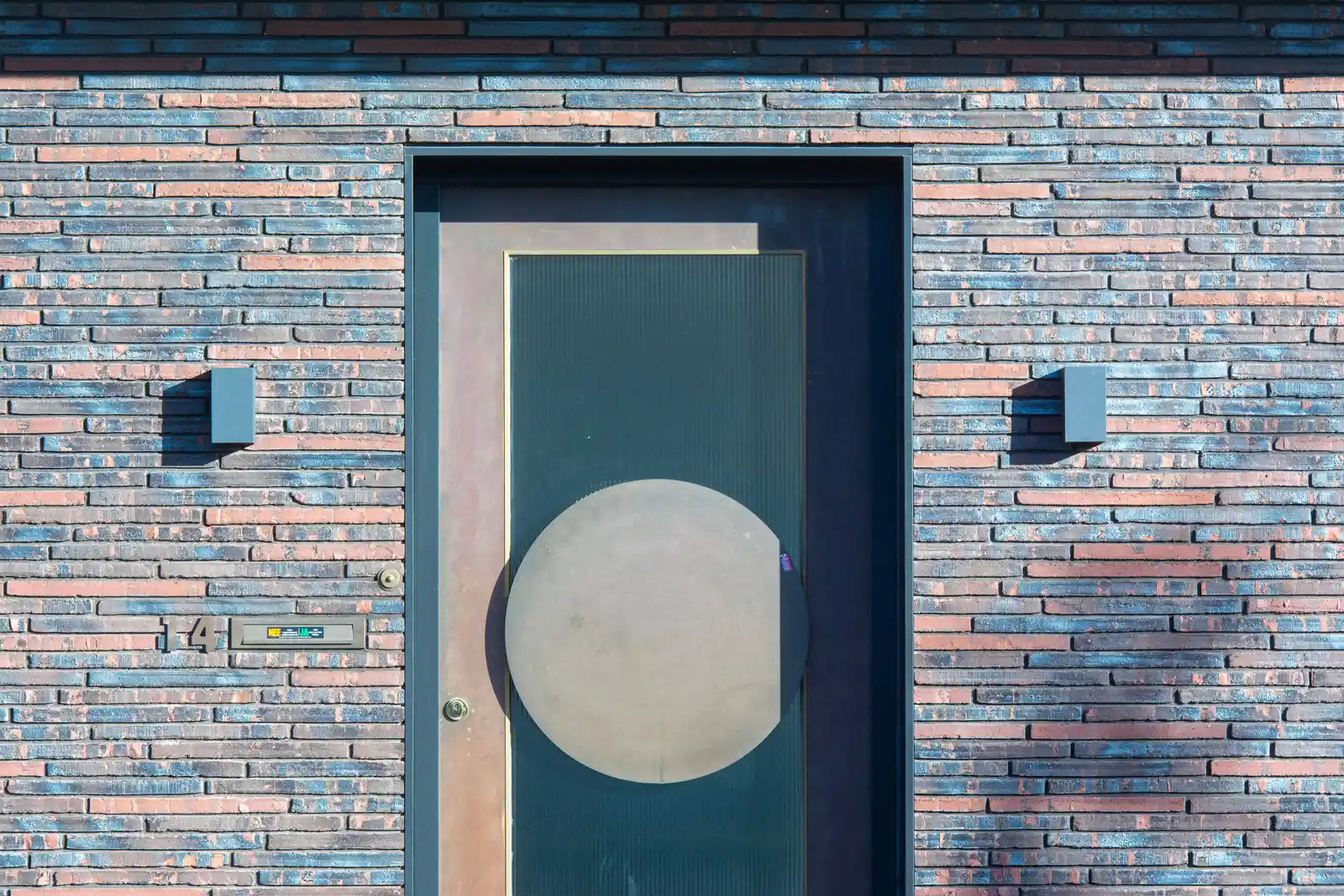 Our Vision — modern brick facade on a new custom home exterior