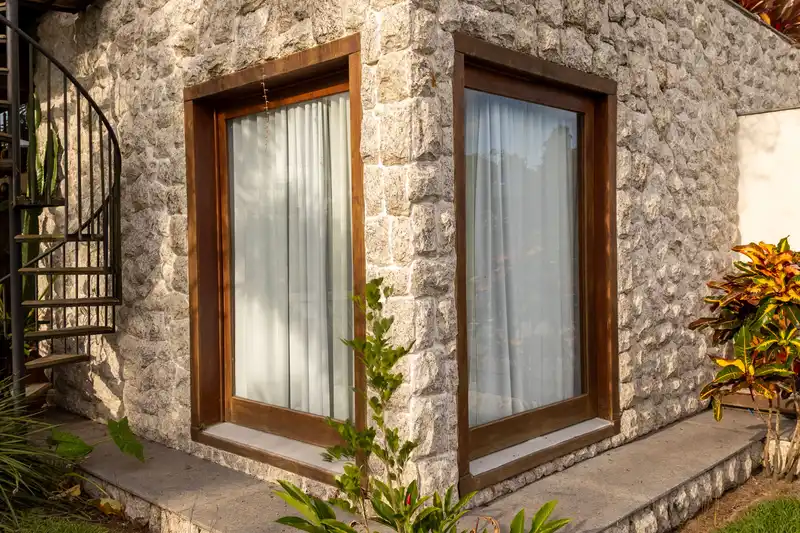 Stone veneer corner return detail on a custom home exterior