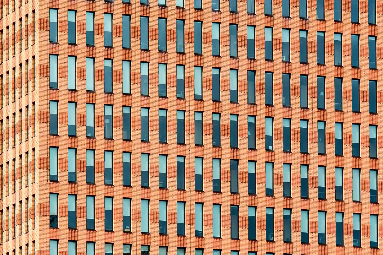 Commercial masonry veneer facade installation on a storefront building