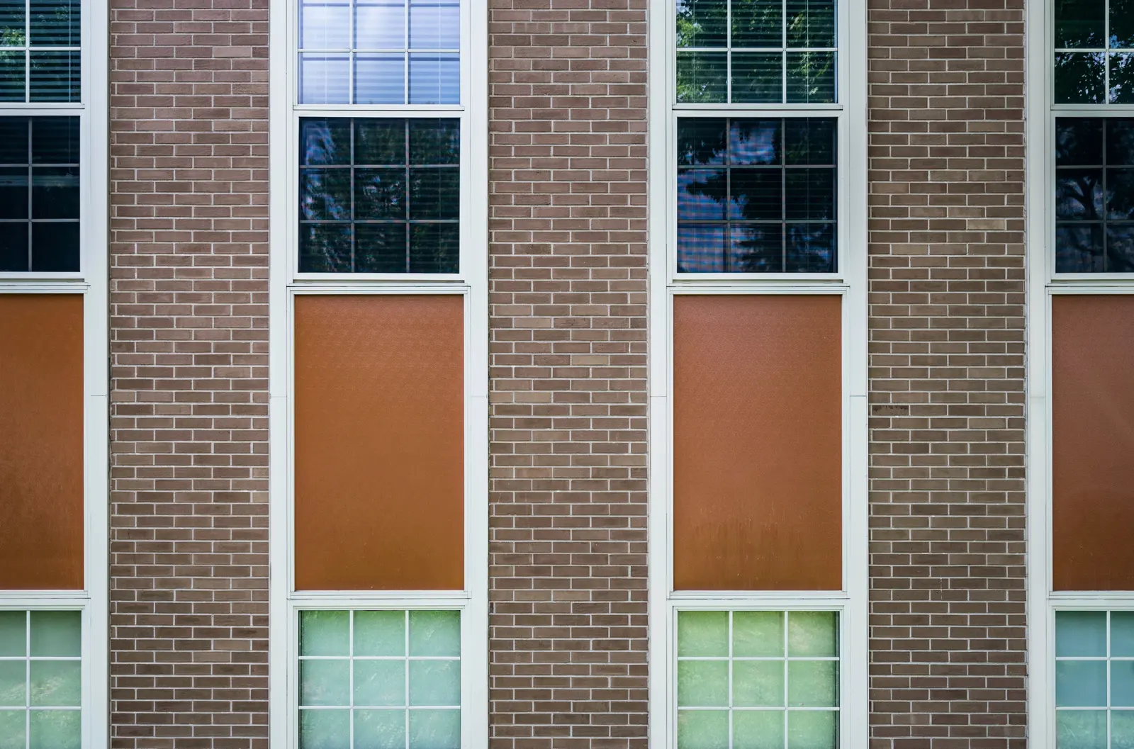New brick wall installation on a commercial building addition