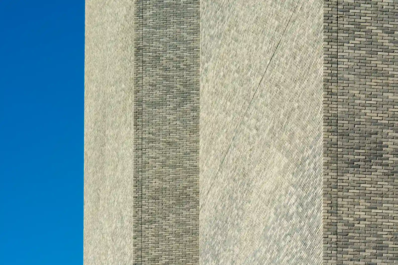 Our Vision — modern brick high-rise facade engineered to outlast the certificate of occupancy