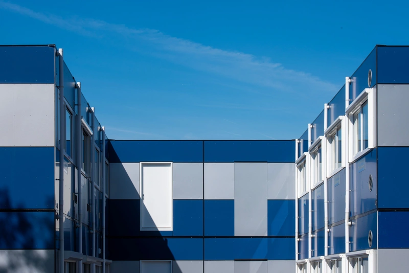 Modular veneer panel system installed on commercial facade