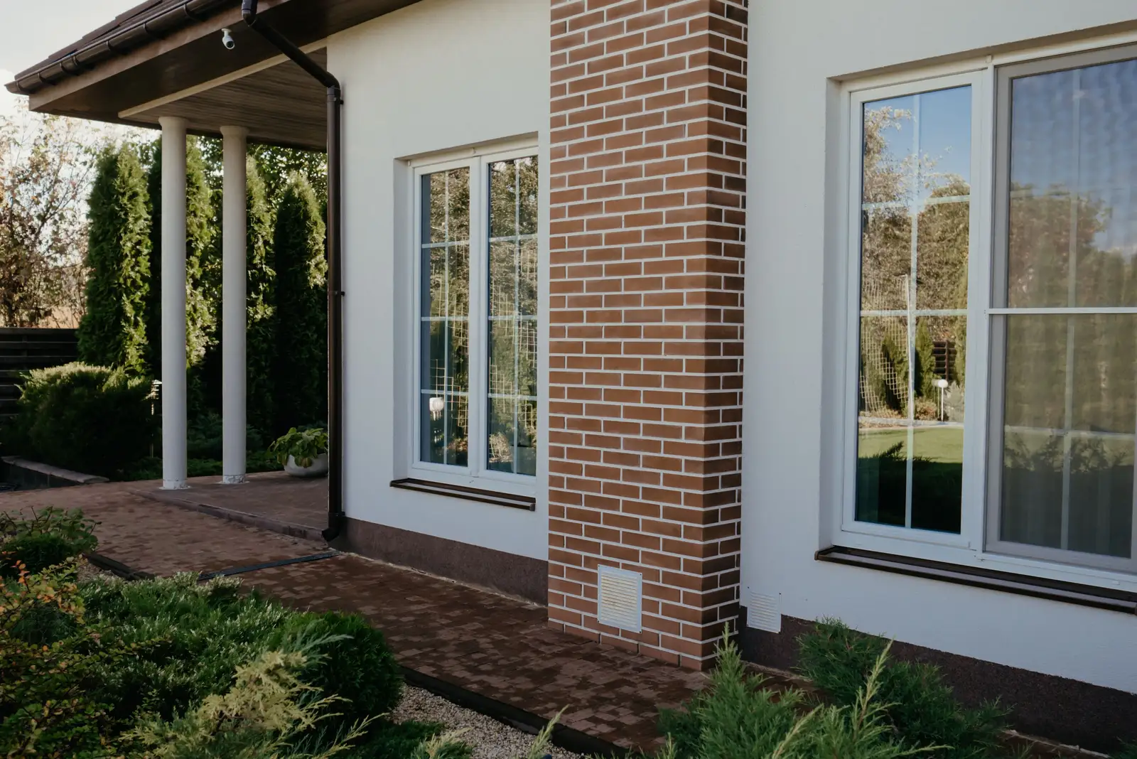 After — seamless finished brick repair matching the surrounding facade