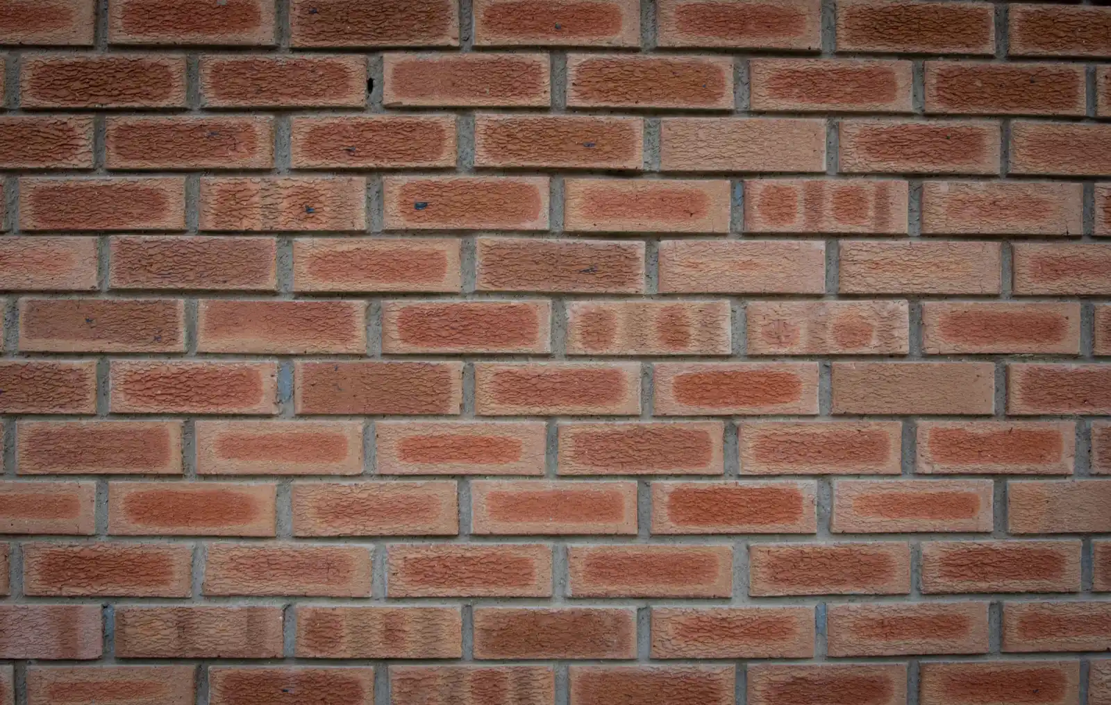 New brick facade wall installation for residential construction