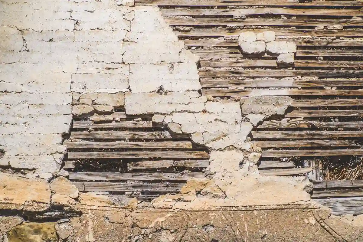 Before: Front elevation — full-bed clay brick laid in running bond with consistent tooled joints