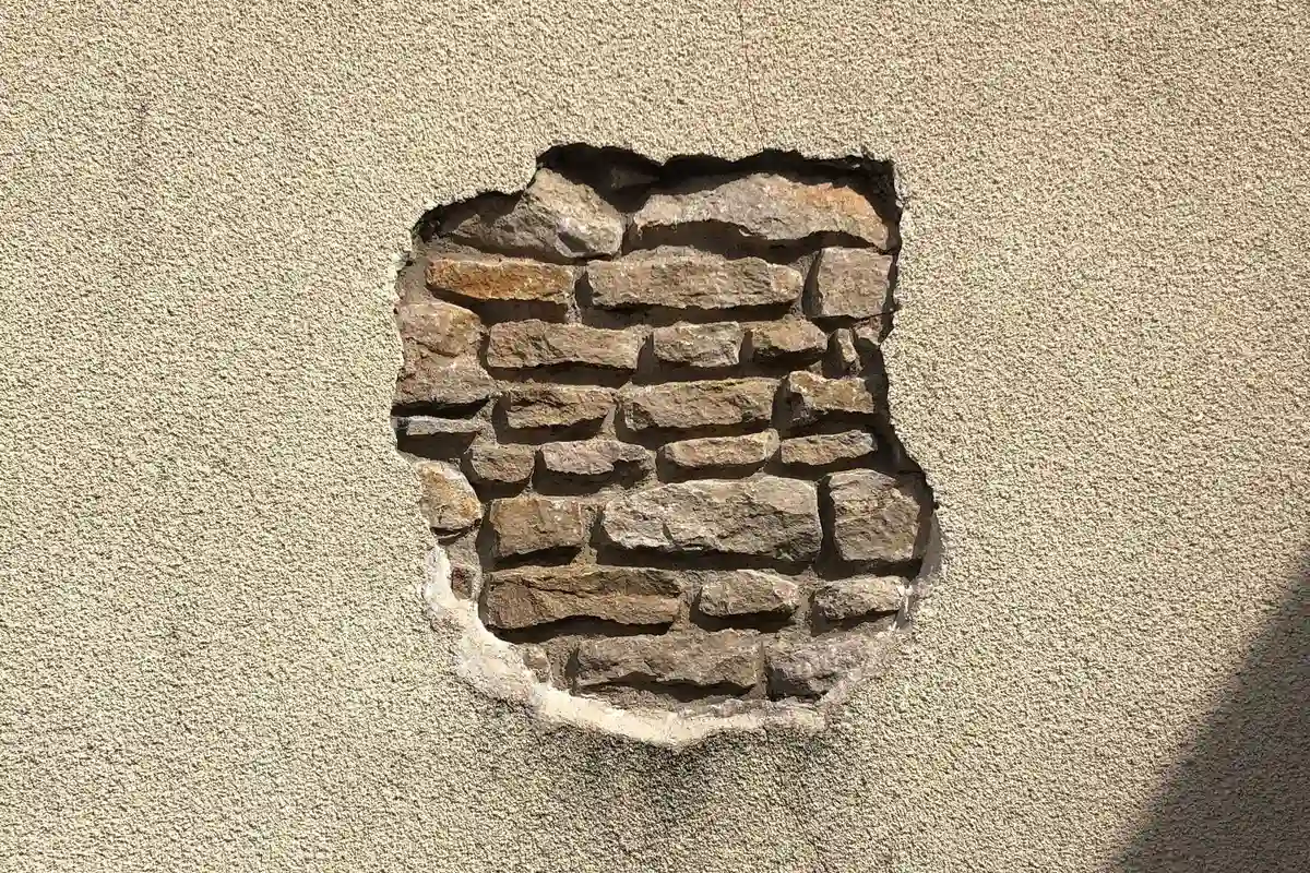 Before: Facade accent — limestone sills and lintels installed with proper sealant at all joints