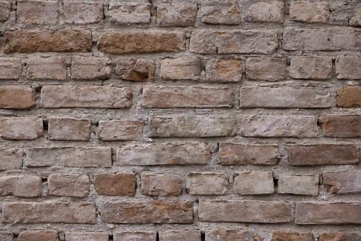 After: Fireplace surround — finish masonry executed to match the home’s exterior material palette