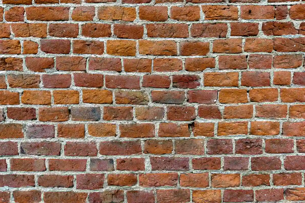 Before: Main facade — joints repointed with custom color-matched mortar, tooled to original profile