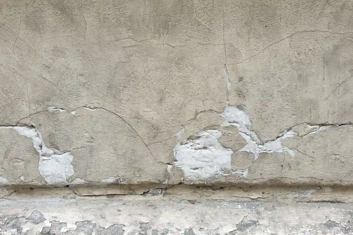 Before: Storefront level — stone and brick detailing executed to architectural specification