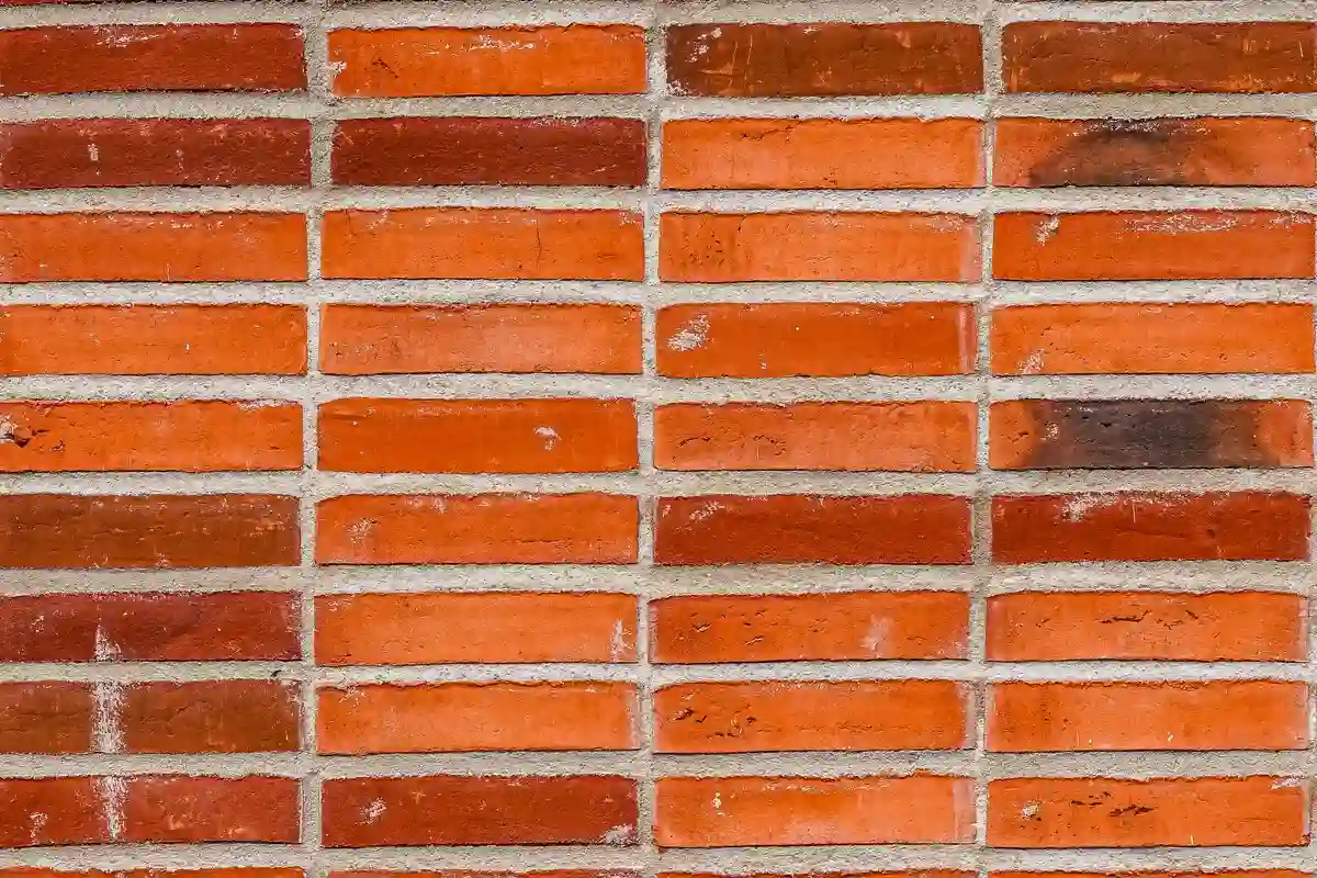 After: Main facade — joints repointed with custom color-matched mortar, tooled to original profile