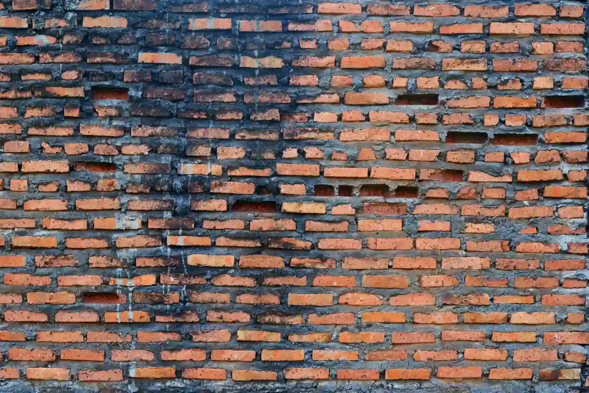 Before: Main facade — joints repointed with custom color-matched mortar, tooled to original profile