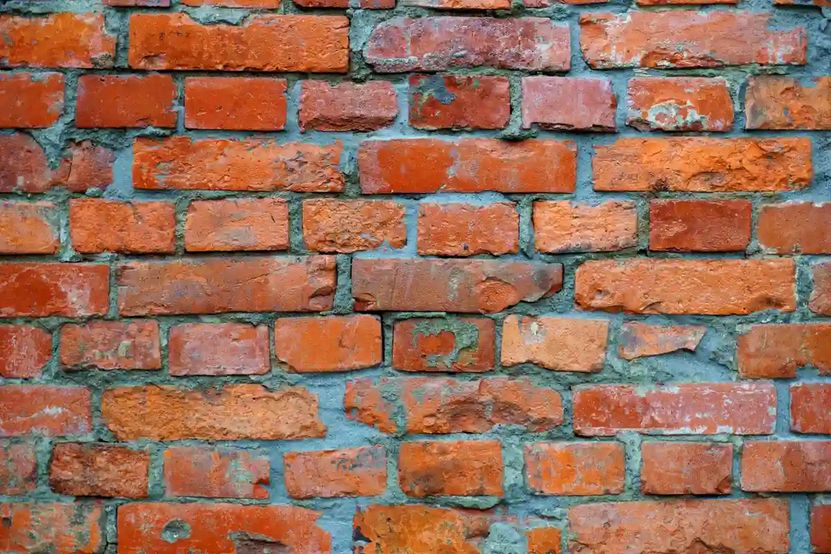 After: Side elevation — brick installation over engineered tie and flashing system