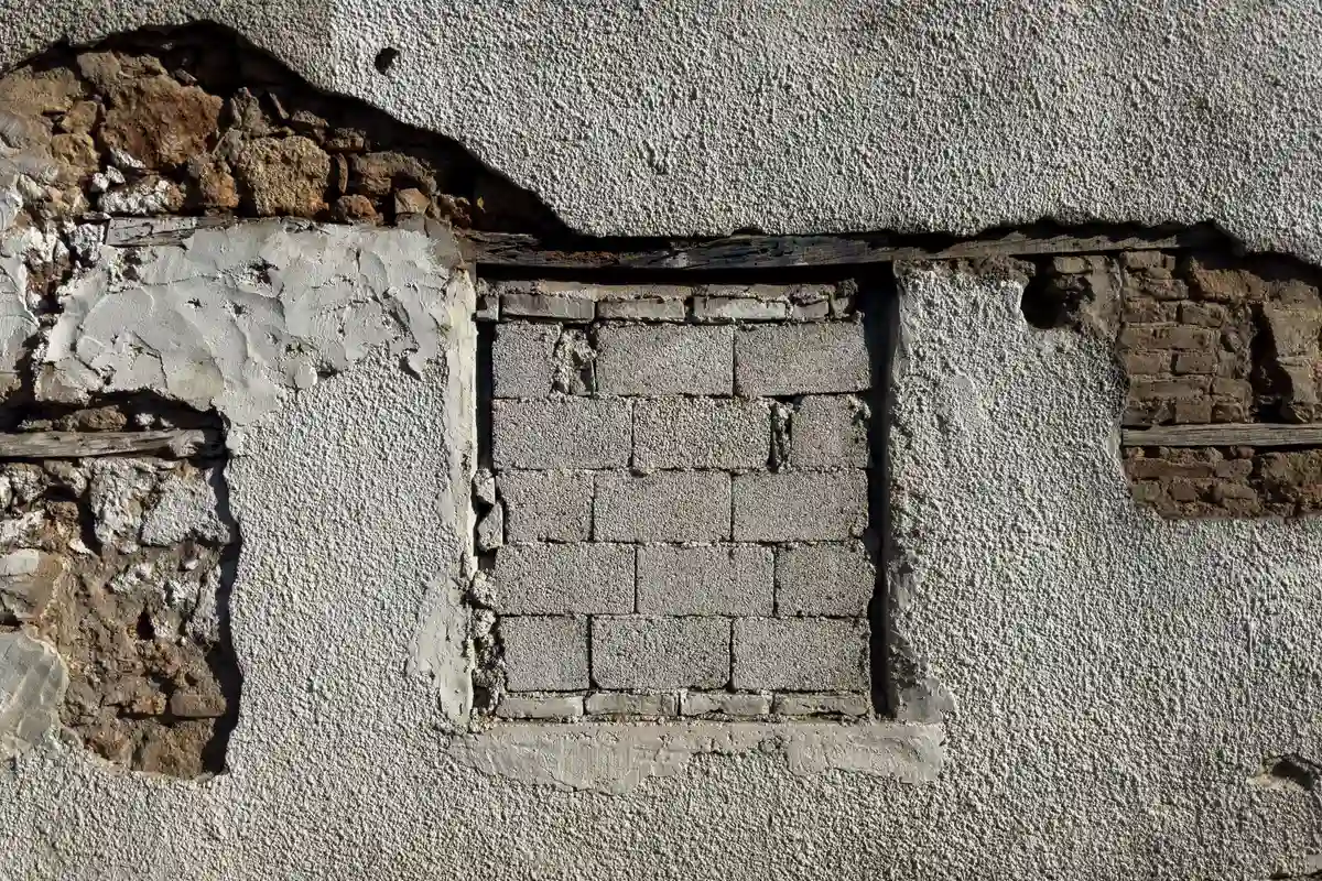 Before: Corner detail — reinforced block corners with proper control joint placement