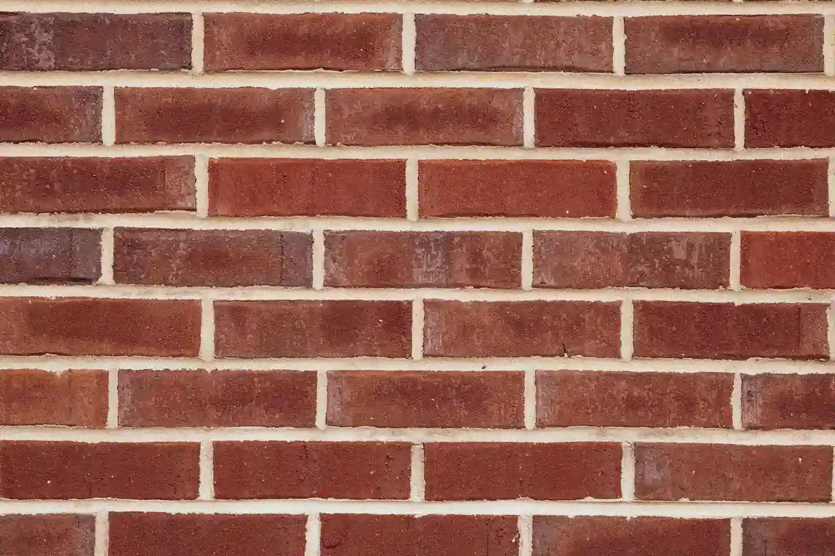 Before: Main facade — joints repointed with custom color-matched mortar, tooled to original profile