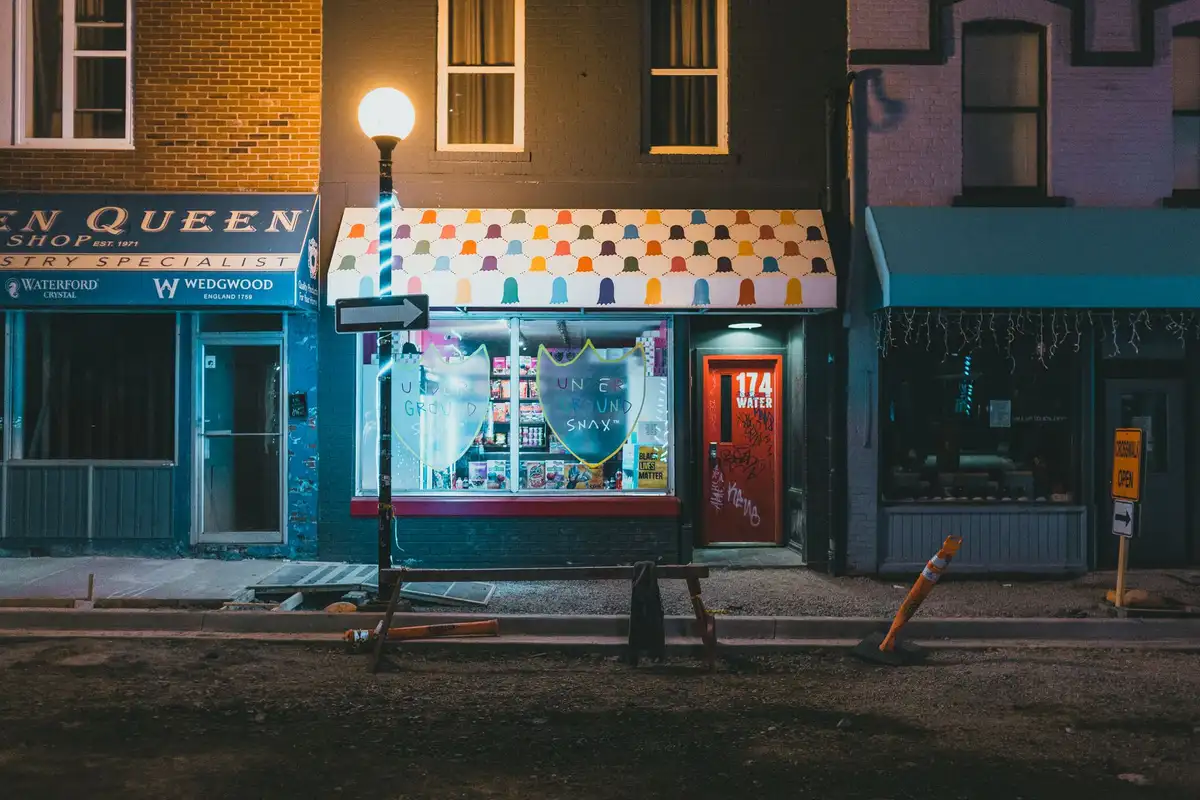 After: Storefront level — stone and brick detailing executed to architectural specification