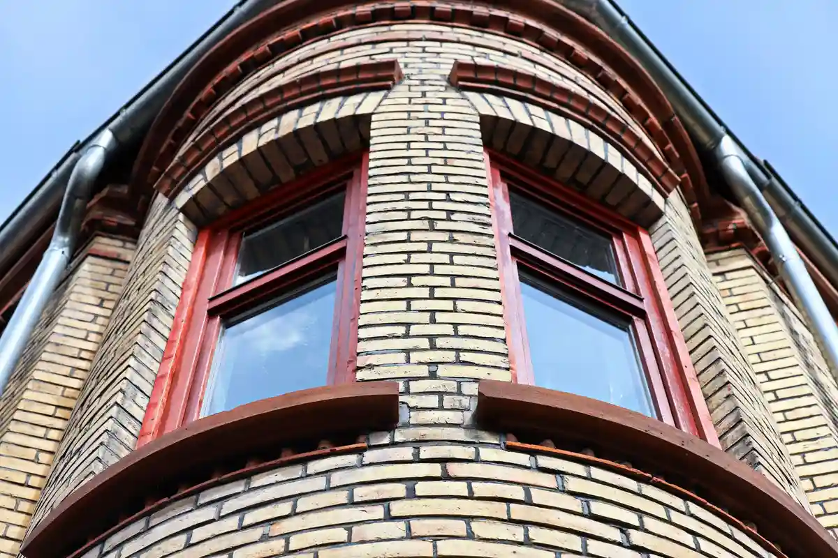 After: Parapet and cap — coping, flashing, and parapet detail completed as one weather system