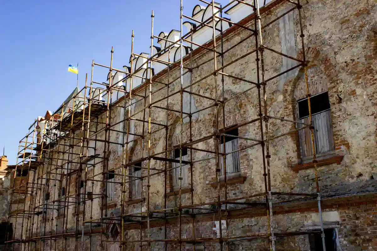 Before: Parapet and cap — coping, flashing, and parapet detail completed as one weather system