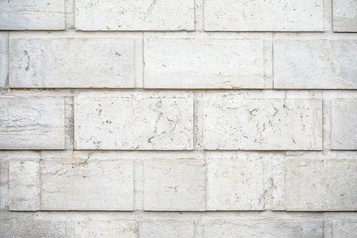 After: Window surrounds — limestone sills and lintels installed flush with consistent mortar profile
