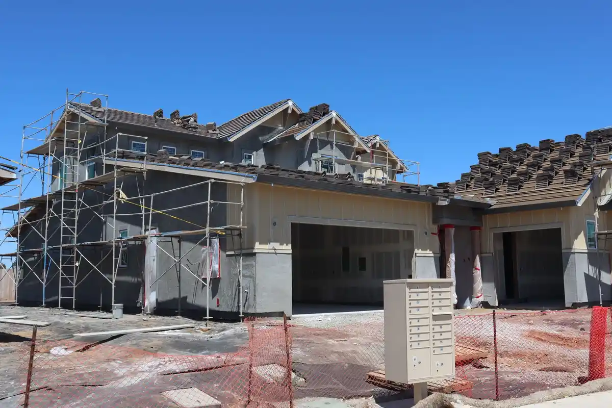 Before: Window surrounds — limestone sills and lintels installed flush with consistent mortar profile