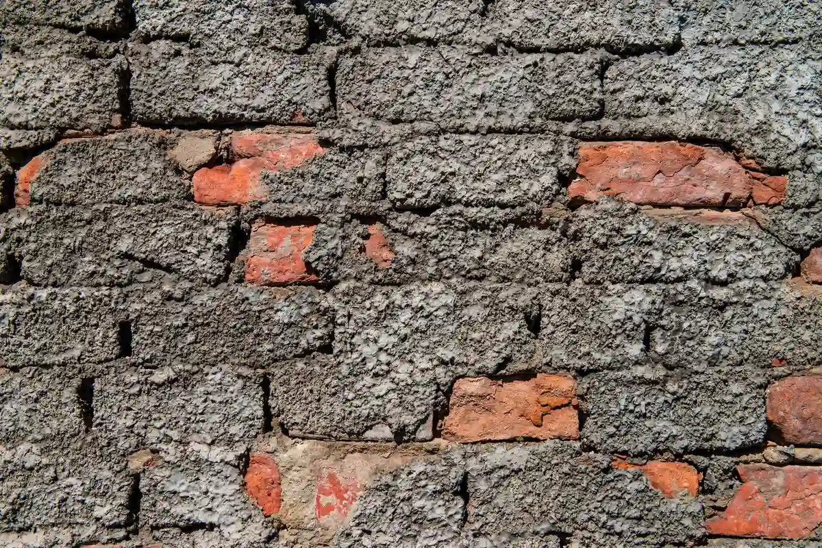After: Main wall section — spalling brick removed and replaced with matched clay brick units