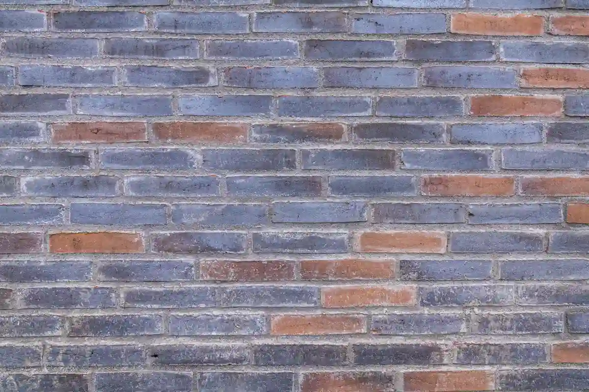 After: Corner detail — damaged corner brick replaced and repointed with color-matched mortar