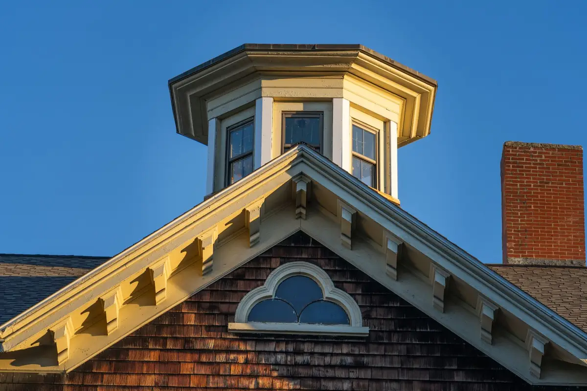 After: Full stack — original leaning chimney demolished to roofline and rebuilt in matching brick