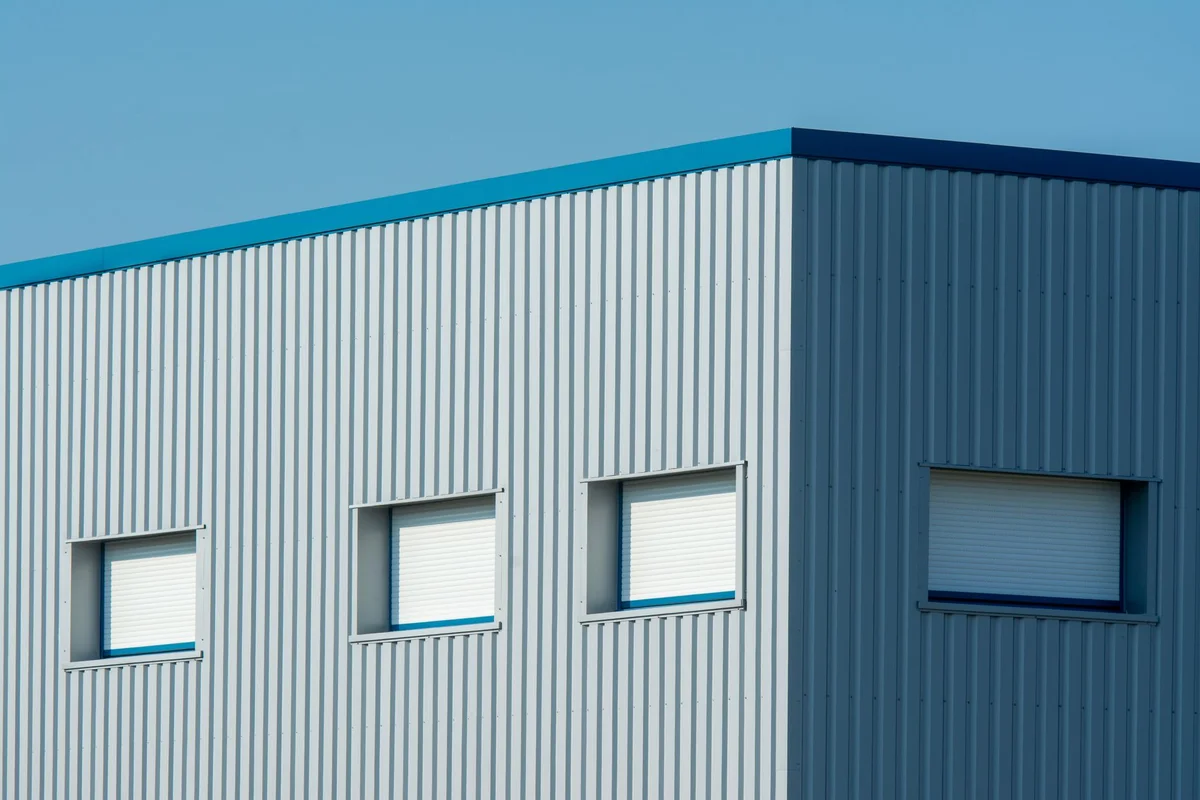 After: Parapet and cap — coping, flashing, and parapet detail completed as one weather system
