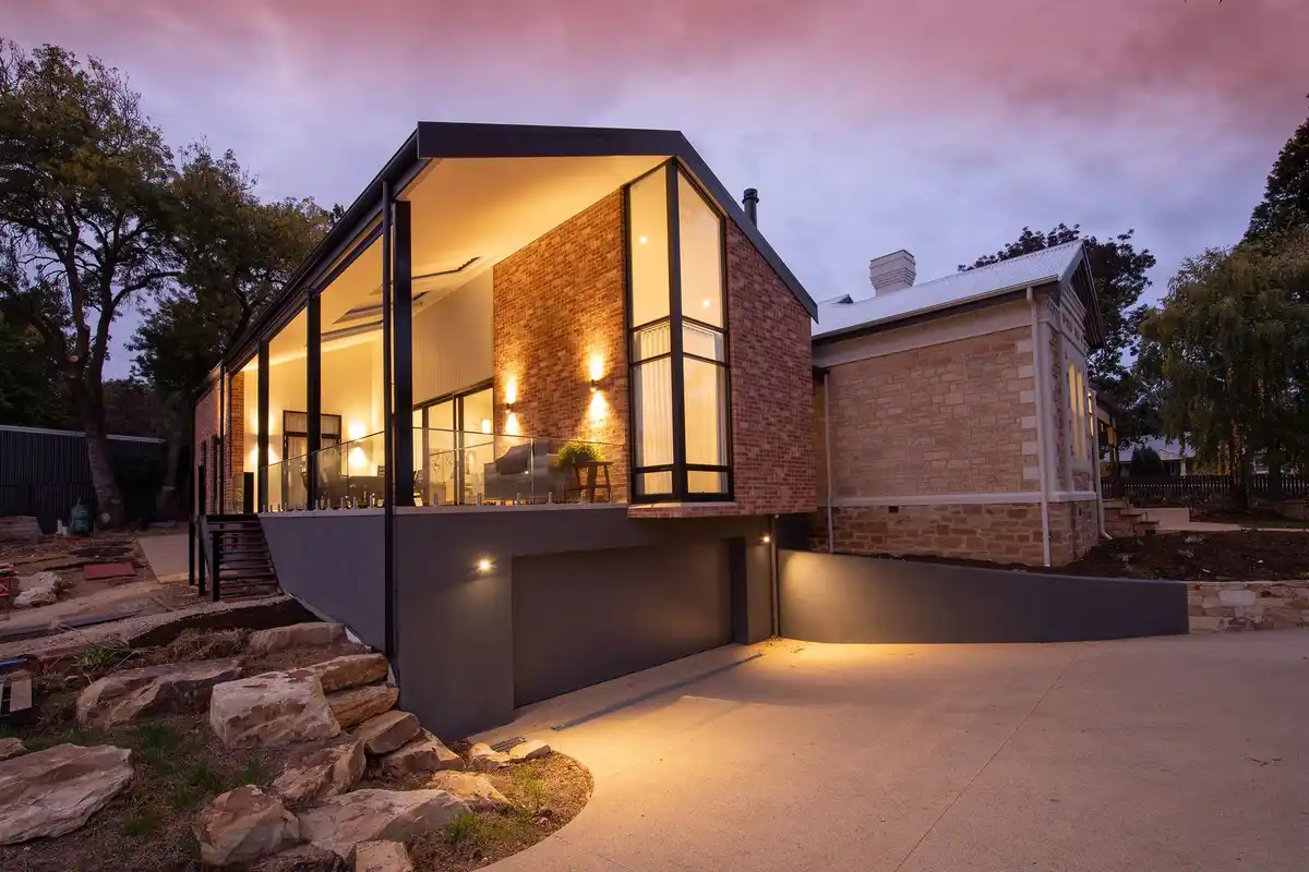 After: Side elevation — brick installation over engineered tie and flashing system