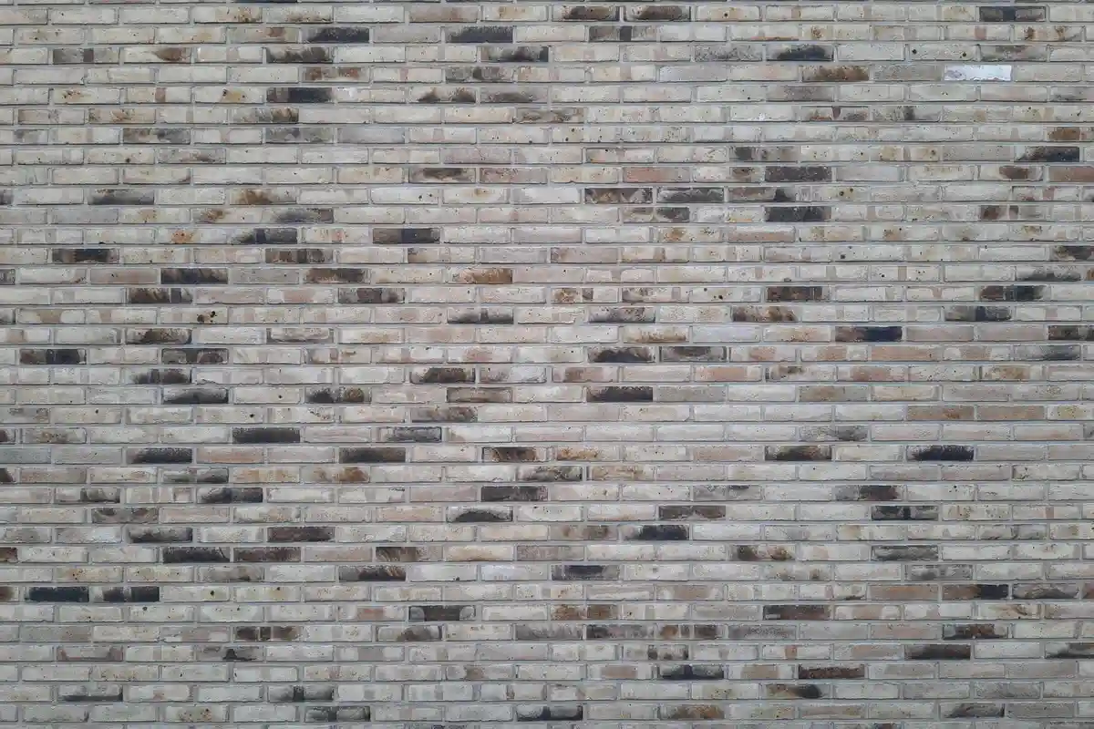 Before: Main facade — joints repointed with custom color-matched mortar, tooled to original profile
